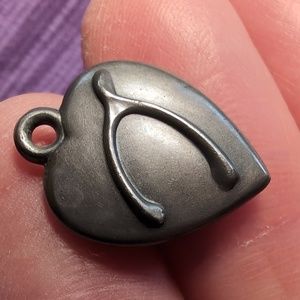 Antique sterling silver puffed heart
